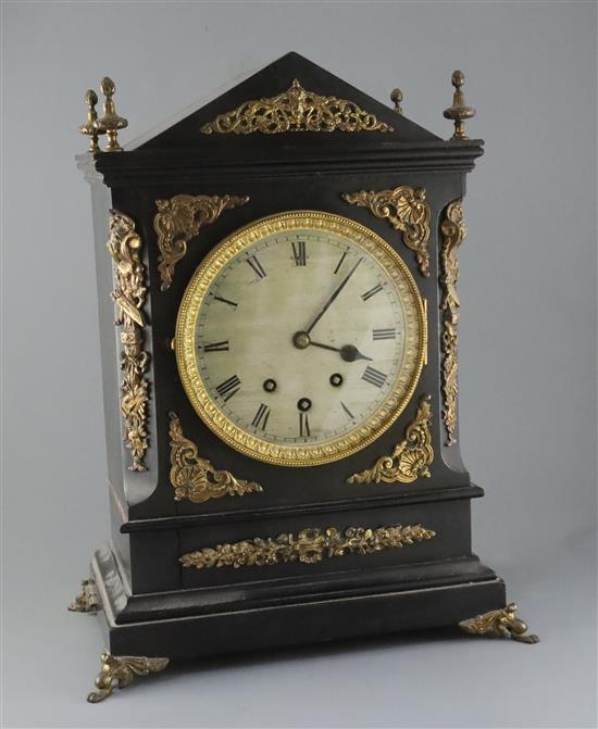 A Victorian ormolu mounted and ebonised chiming bracket clock, H.21in., with mahogany wall bracket